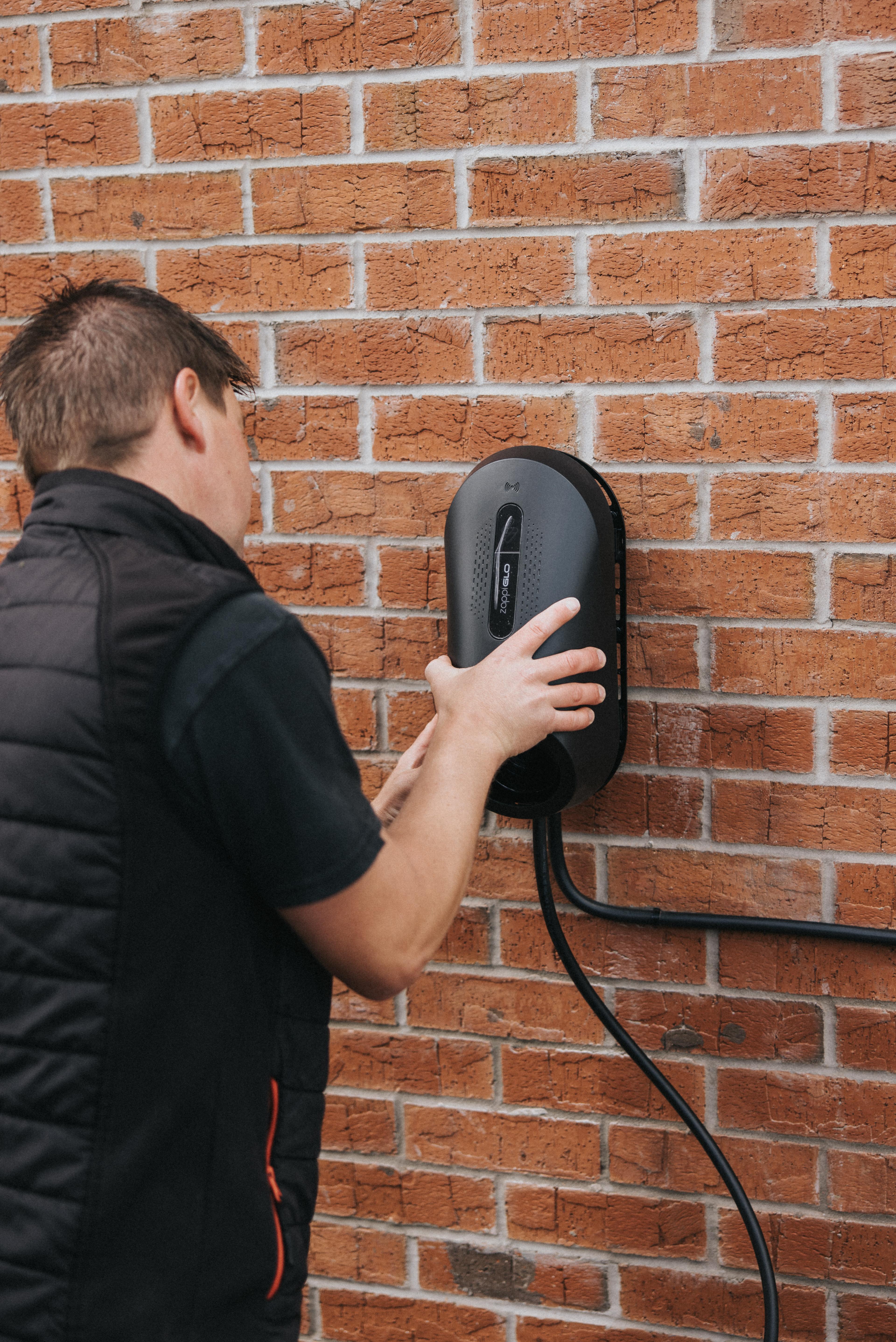 zappiGLO electric car charger being installed