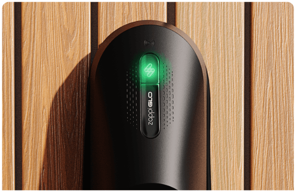 zappiGLO electric car charger on wood panel wall